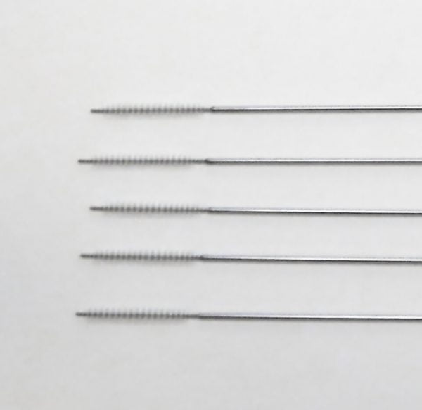 cleaning brushes for reusable needle guides